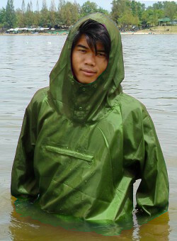 wet purple anorak in lake