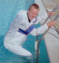 windbreaker anorak as modest swimwear in pool